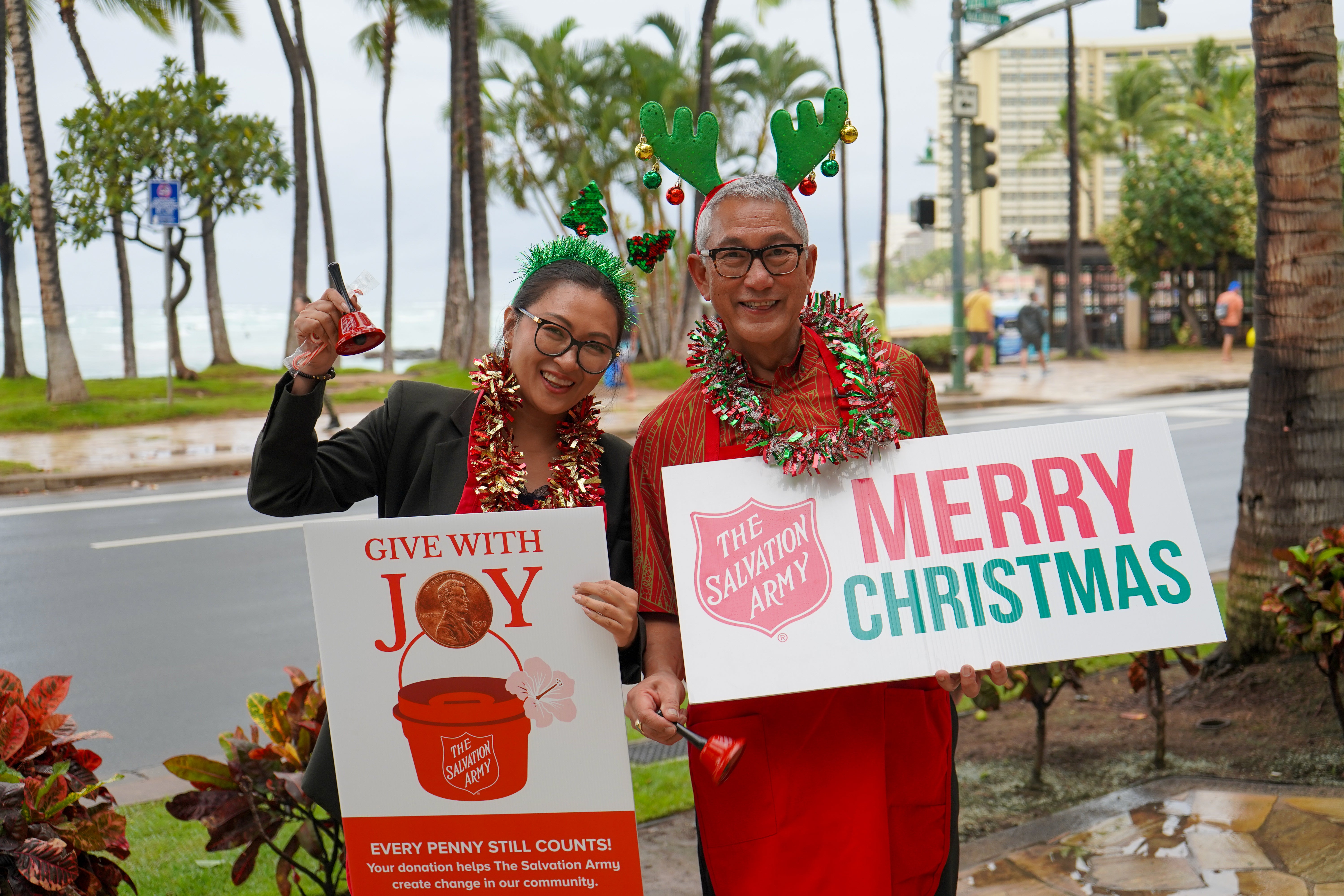 Salvation Army bell ringers at a Red Kettle