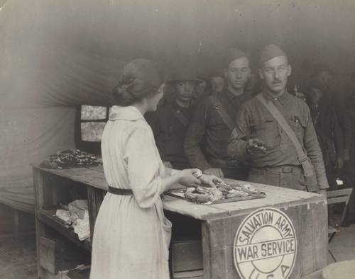 Donut-Lassie-distributing-donuts.png
