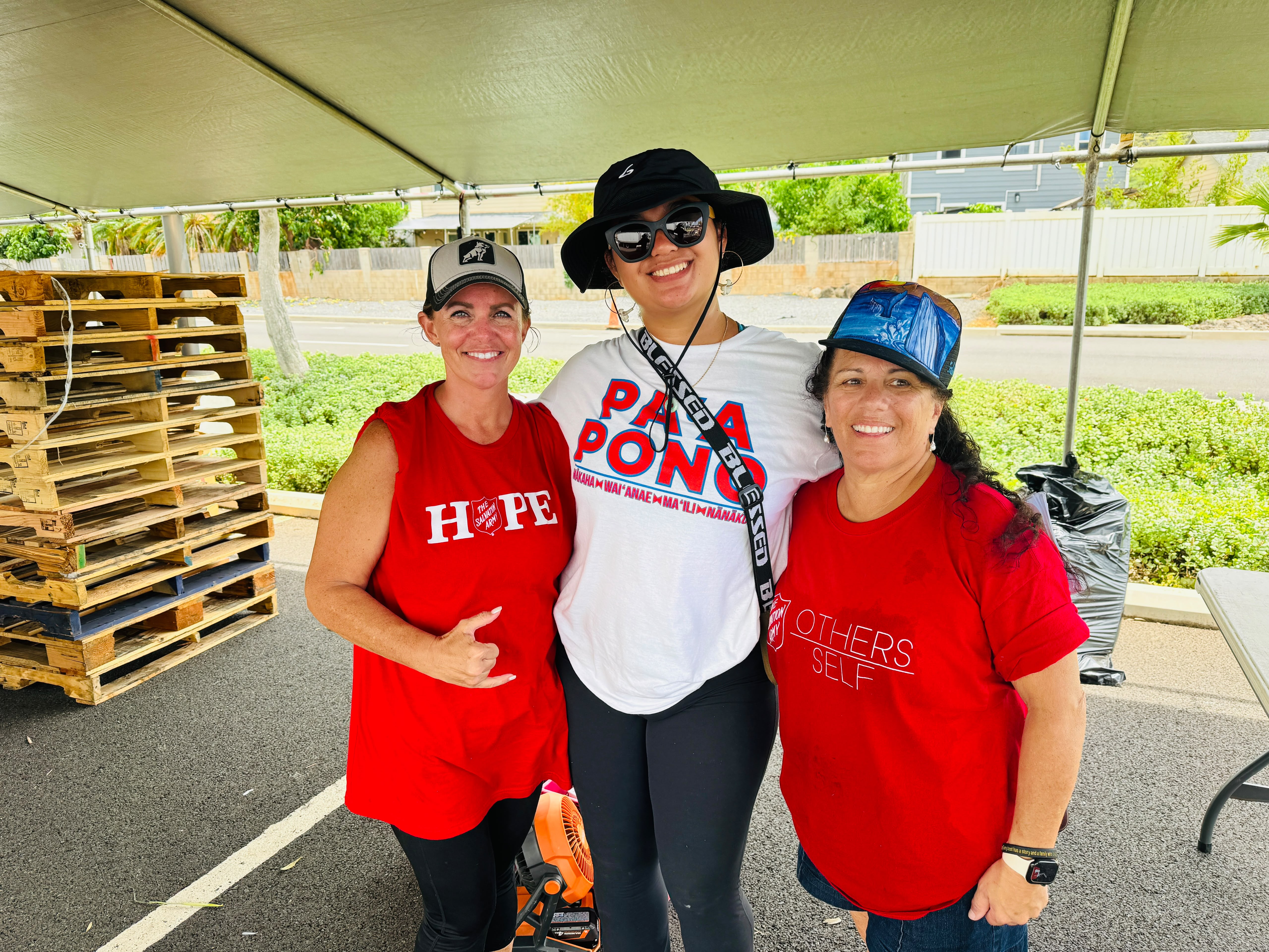 Cross-organization volunteers supporting community distributions on O'ahu