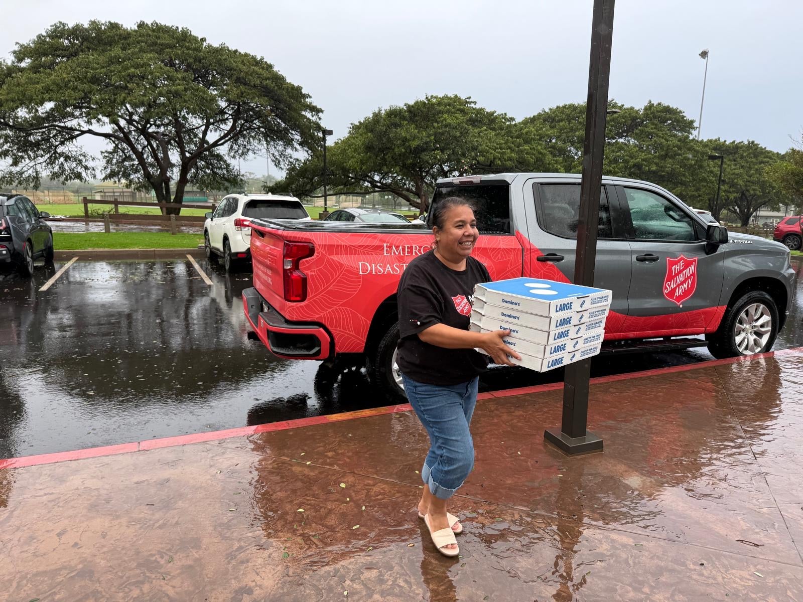 Captain Howard delivers pizzas in the rain