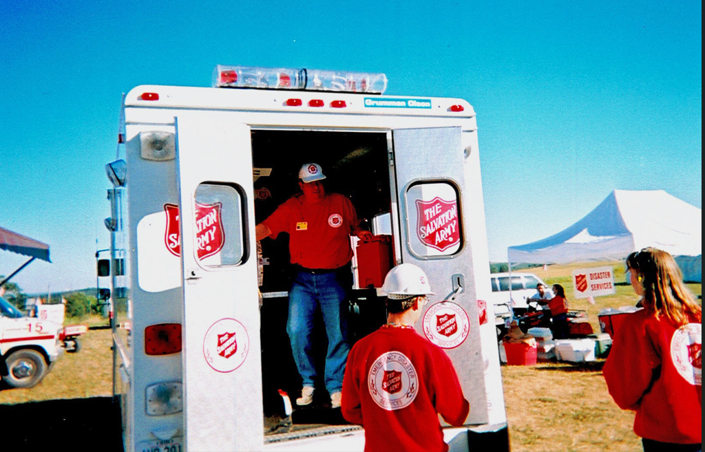 A Salvation Army officer serving from inside a canteen truck at the Flight 93 crash site.
