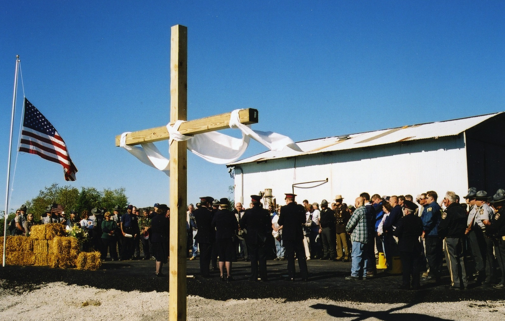 First responders gathered around a memorial cross for a worship service near the Flight 93 crash site.