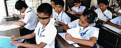 Children at school in a poor community sponsored by The Salvation Army.